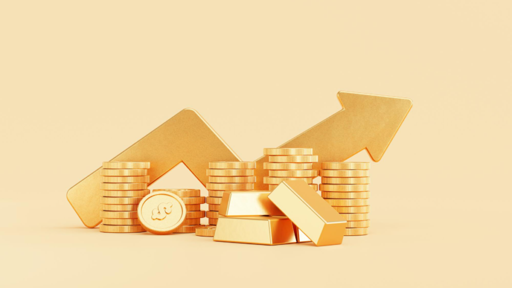 Crescimento de investimentos em ouro com barras e moedas empilhadas.